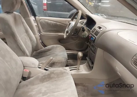 1998 Toyota Corolla Le z USA, uszkodzony, nr VIN 2T1BR18E1WC018347